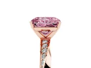 Fancy Pink Radiant Cut Diamond Engagement Ring Set in Rose gold with Side Stone Accents and Prong Setting