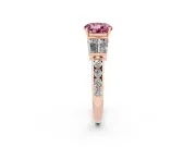 Fancy Pink Round Cut Diamond Engagement Ring Set in Rose gold with Baguette Side Stones and Channel Set Band