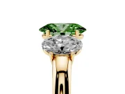 Fancy Green Oval Cut Diamond Three-Stone Ring Set in Yellow gold with Bold Center and Classic Band