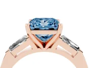 Fancy Blue Princess Cut Diamond Solitaire Ring Set in Rose gold with Tapered Baguette Side Stones and Prong Setting
