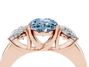 Fancy Blue Oval Cut Diamond Three-Stone Ring Set in Rose gold with Bold Center and Classic Band