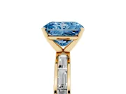 Fancy Blue Radiant Cut Diamond Solitaire Ring Set in Yellow gold with Channel-Set Baguette Band and Prong Setting