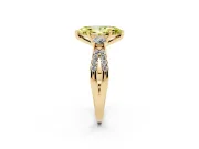 Fancy Yellow Marquise Cut Diamond Three-Stone Ring Set in Yellow gold with Pavé Split Shank and Prong Setting