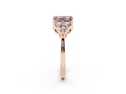 Fancy Pink Emerald Cut Diamond Solitaire Ring Set in Rose gold with Cluster Accents on Each Side