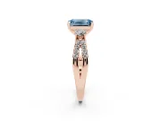 Fancy Blue Emerald Cut Diamond Three-Stone Ring Set in Rose gold with Pavé Split Shank and Prong Setting