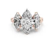 Marquise Cut Diamond Three-Stone Ring Set in Rose gold with Braided Band