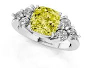 Fancy Yellow Cushion Cut Diamond Solitaire Ring Set in White gold with Cluster Accents on Each Side