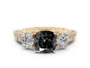 Fancy Black Cushion Cut Diamond Three-Stone Ring Set in Yellow gold with Round Side Stones and Pavé Band