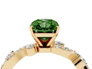 Fancy Green Radiant Cut Diamond Solitaire Twisted Band Set in Yellow gold with Pavé Setting