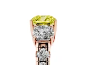 Fancy Yellow Cushion Cut Diamond Three-Stone Ring Set in Rose gold with Pavé Band