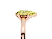 Fancy Yellow Pear Cut Diamond Solitaire Engagement Ring Set in Rose gold with Prong Setting on a Classic Band