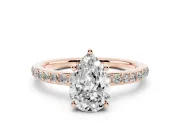 Pear Cut Diamond Pavé Band Ring Set in Rose gold with Prong-Set Center Stone