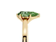 Fancy Green Pear Cut Diamond Solitaire Engagement Ring Set in Yellow gold with Prong Setting on a Classic Band