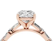 Cushion Cut Diamond Solitaire Set in Rose gold with Side Baguettes and Channel Set Band