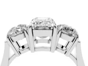 Emerald Cut Diamond Three-Stone Ring Set in Platinum with Round Accent Stones and Plain Band