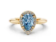 Fancy Blue Pear Cut Diamond Halo Engagement Ring Set in Yellow gold with Plain Split Shank and Prong Setting