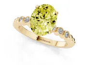 Fancy Yellow Oval Cut Diamond Solitaire Engagement Ring Set in Yellow gold with Bezel Accents on Beaded Band