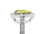 Fancy Yellow Pear Cut Diamond Halo Pavé Engagement Ring Set in White gold with Bezel Setting