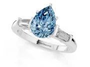 Fancy Blue Pear Cut Diamond Solitaire Ring Set in Silver with Tapered Baguette Accents and Prong Setting