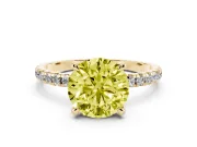 Fancy Yellow Round Cut Diamond Brilliant Solitaire Ring Set in Yellow gold with Pavé Band and Prong Setting