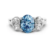 Fancy Blue Oval Cut Diamond Three-Stone Ring Set in Silver with Polished Band and Prong Setting