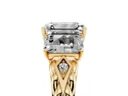Emerald Cut Diamond Three-Stone Ring Set in Yellow gold with Braided Band