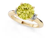Fancy Yellow Three-Stone Round Cut Diamond Ring Set in Yellow gold with Prong Setting and Plain Band