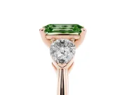 Fancy Green Three-Stone Emerald Cut Diamond Ring Set in Rose gold with Pear Side Stones and Prong Setting