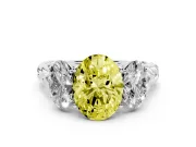 Fancy Yellow Oval Cut Diamond Three-Stone Ring Set in Silver with Braided Band