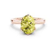 Fancy Yellow Oval Cut Diamond Solitaire Engagement Ring Set in Rose gold with Slim Tapered Solitaire Band