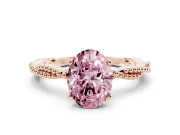 Fancy Pink Oval Cut Diamond Solitaire Ring Set in Rose gold with Twisted Band and Bead Prong Setting