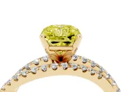 Fancy Yellow Radiant Cut Diamond Solitaire Twist Band Ring Set in Yellow gold with Pavé Setting and Prong Head