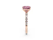 Fancy Pink Radiant Cut Diamond Solitaire Ring Set in Rose gold with Round Pavé Band and Prong Setting