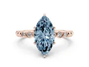 Fancy Blue Marquise Cut Diamond Solitaire Engagement Ring Set in Rose gold with Bezel Accents on Beaded Band