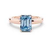 Fancy Blue Emerald Cut Diamond Solitaire Ring Set in Rose gold with Prong Head and Smooth Polished Band