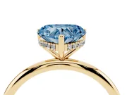 Fancy Blue Heart Cut Diamond Solitaire Engagement Ring Set in Yellow gold with Prong Setting and Polished Band