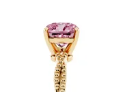 Fancy Pink Cushion Cut Diamond Solitaire Ring Set in Yellow gold with Twisted Band and Bead Prong Setting