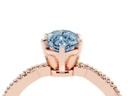 Fancy Blue Marquise Cut Diamond Solitaire Ring Set in Rose gold with Twisted Band and Bead Prong Setting