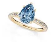 Fancy Blue Pear Cut Diamond Pavé Band Ring Set in Yellow gold with Prong-Set Center Stone