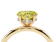 Fancy Yellow Heart Cut Diamond Solitaire Ring Set in Yellow gold with Thin Band and Prong Setting