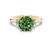 Fancy Green Three-Stone Round Cut Diamond Ring Set in Yellow gold with Prong Setting and Plain Band