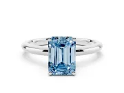 Fancy Blue Emerald Cut Diamond Solitaire Engagement Ring Set in Silver with Prong Setting and Polished Band