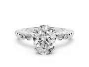 Oval Cut Diamond Solitaire Engagement Ring Set in Silver with Bezel Accents on Beaded Band