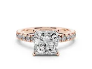 Princess Cut Diamond Solitaire Pavé Engagement Ring Set in Rose gold with Round Band and Prong Setting