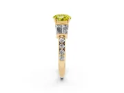 Fancy Yellow Round Cut Diamond Engagement Ring Set in Yellow gold with Baguette Side Stones and Channel Set Band