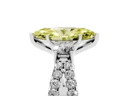 Fancy Yellow Marquise Cut Diamond Three-Stone Ring Set in White gold with Pavé Split Shank and Prong Setting
