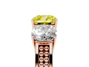Fancy Yellow Cushion Cut Diamond Three-Stone Ring Set in Rose gold with Textured Band