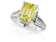 Fancy Yellow Emerald Cut Diamond Pavé Split Shank Solitaire Ring Set in Platinum with Prong Setting