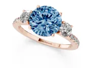 Fancy Blue Round Cut Diamond Three-Stone Ring Set in Rose gold with Pavé Band and Graduated Sides