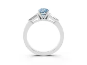 Fancy Blue Pear Cut Diamond Solitaire Ring Set in Platinum with Tapered Baguette Accents and Prong Setting